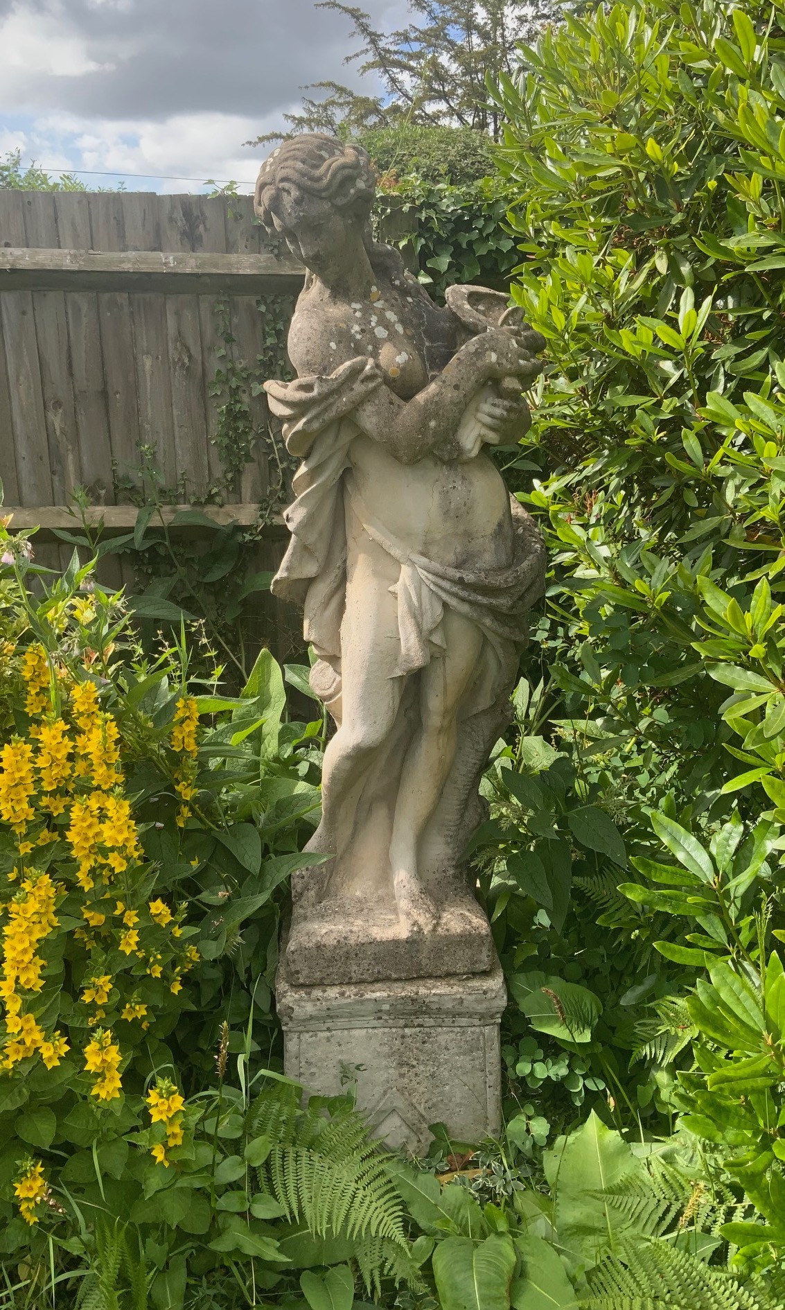 A set of four reconstituted stone garden figures, representing the Four Seasons, tallest 170cm